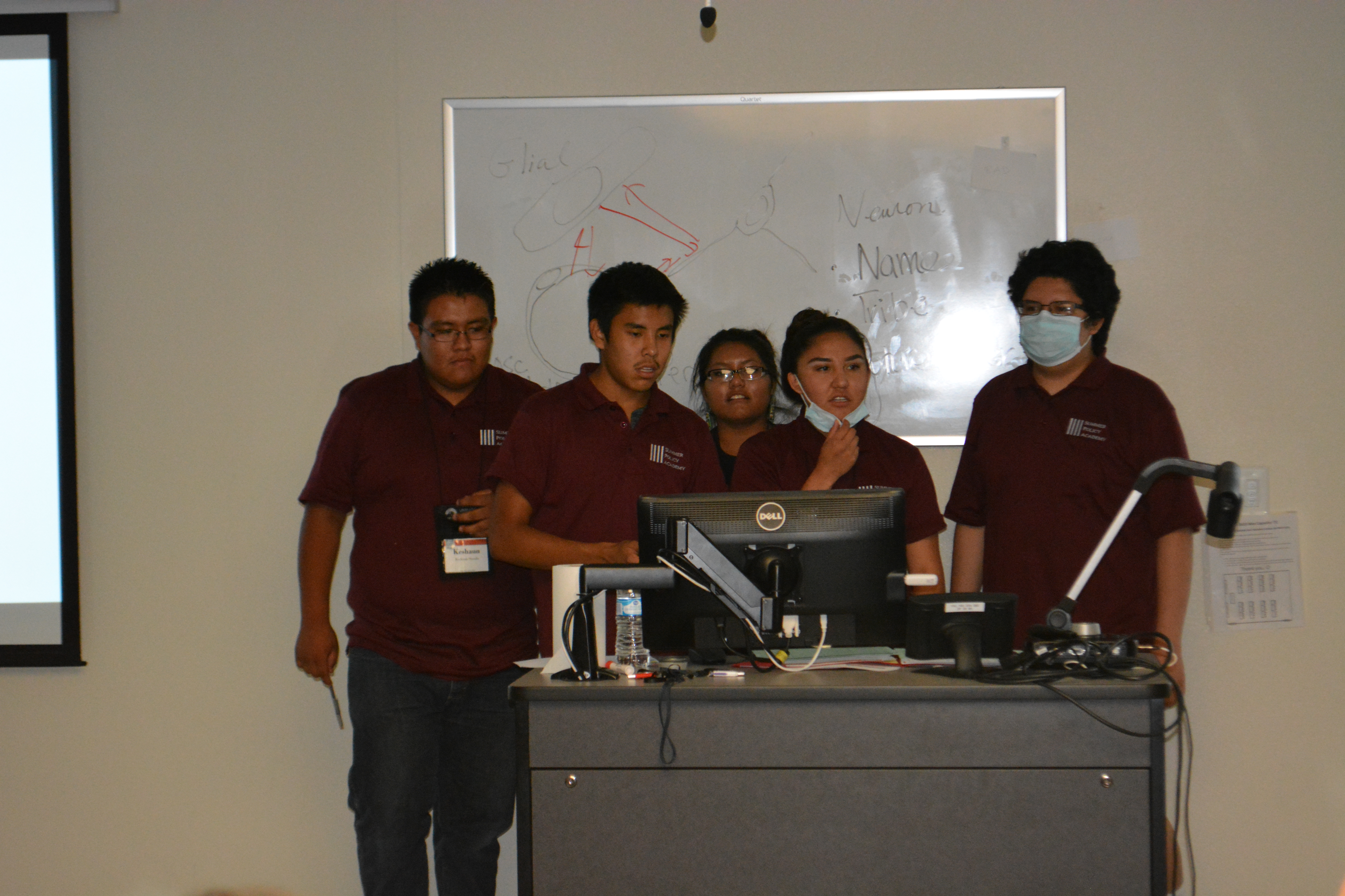 Group of students presenting.