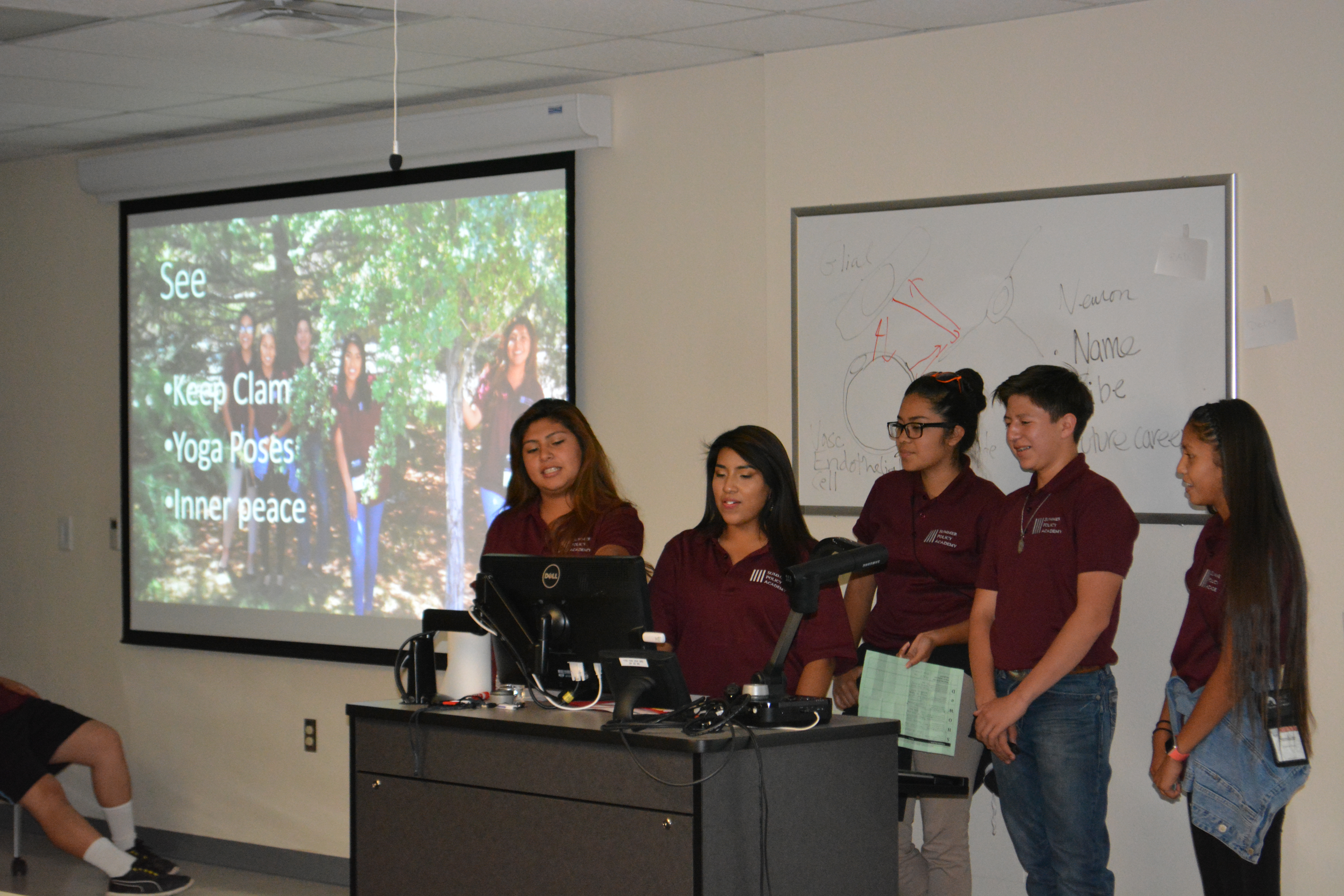 Group of students presenting.