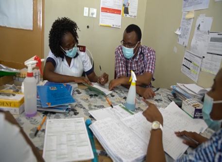Namibian providers review patient cases 