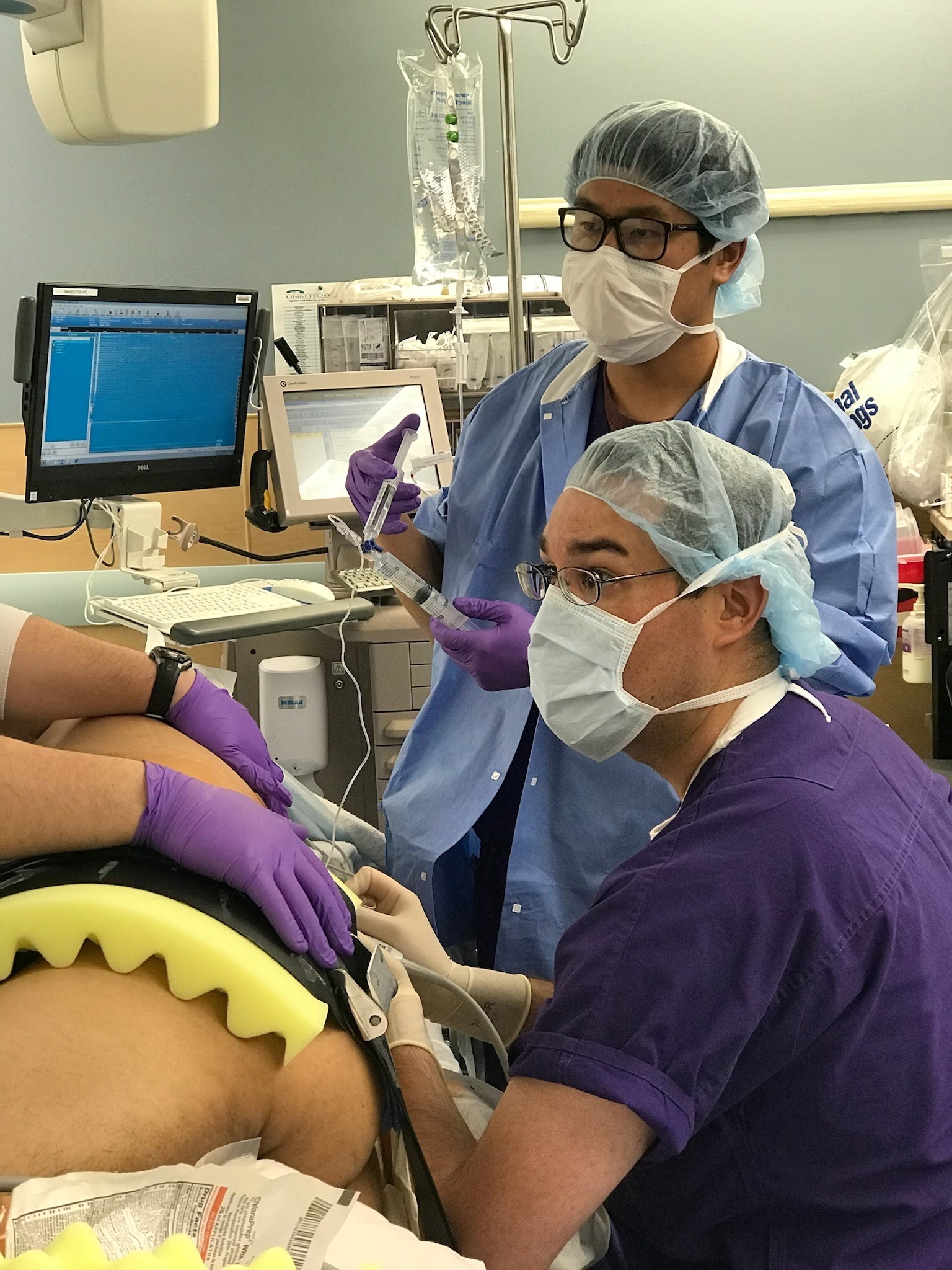 fellows performing procedure