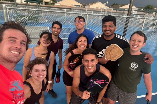 Residents enjoying pickleball at Manzano Mesa courts.