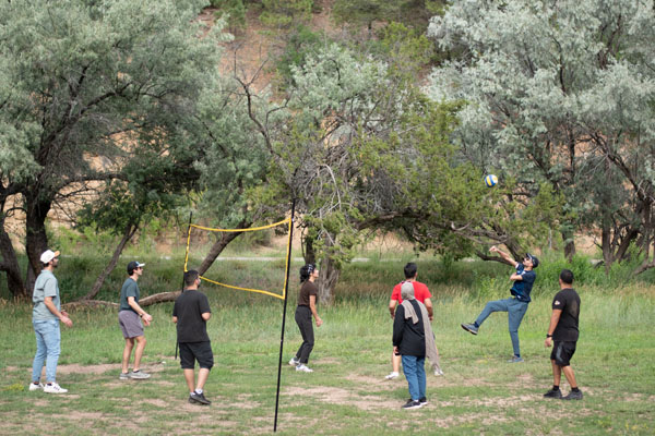 Summer Bash 2024; Sandia Mountains, grilling, and volleyball.