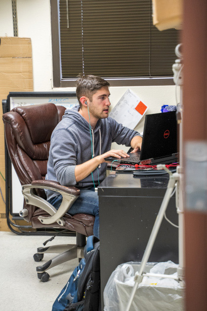 Lab member working at computer.