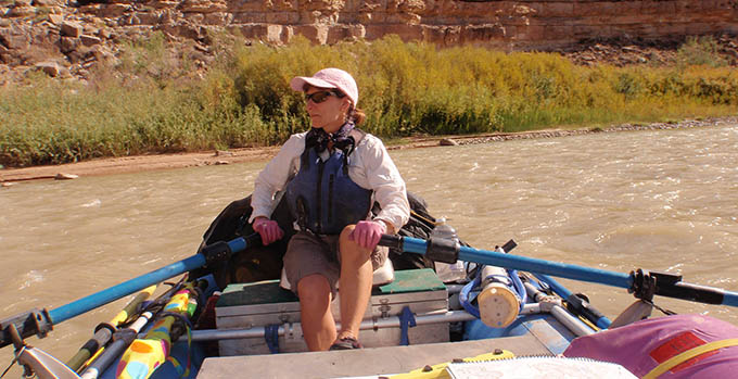 Irene Agostini, MD kayaking down a river
