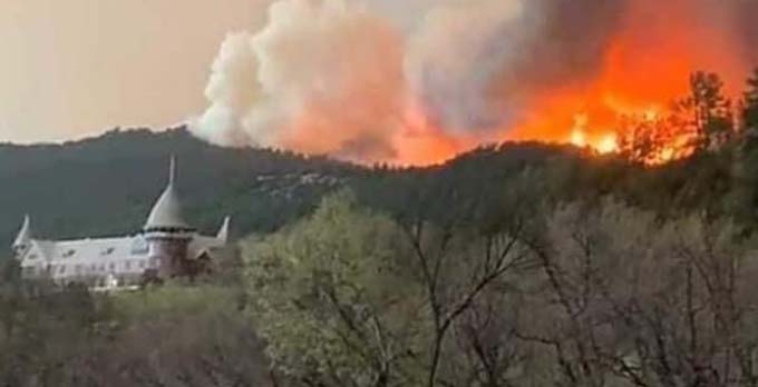 Wildfires burning in the hills of northern New Mexico