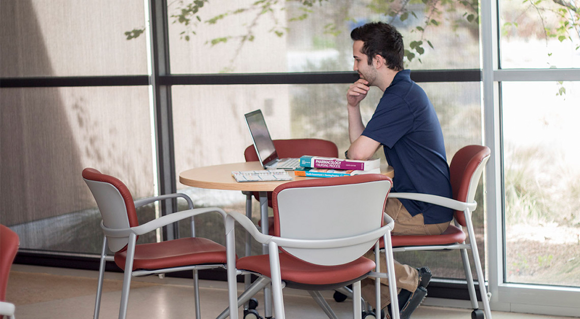 student studying at table