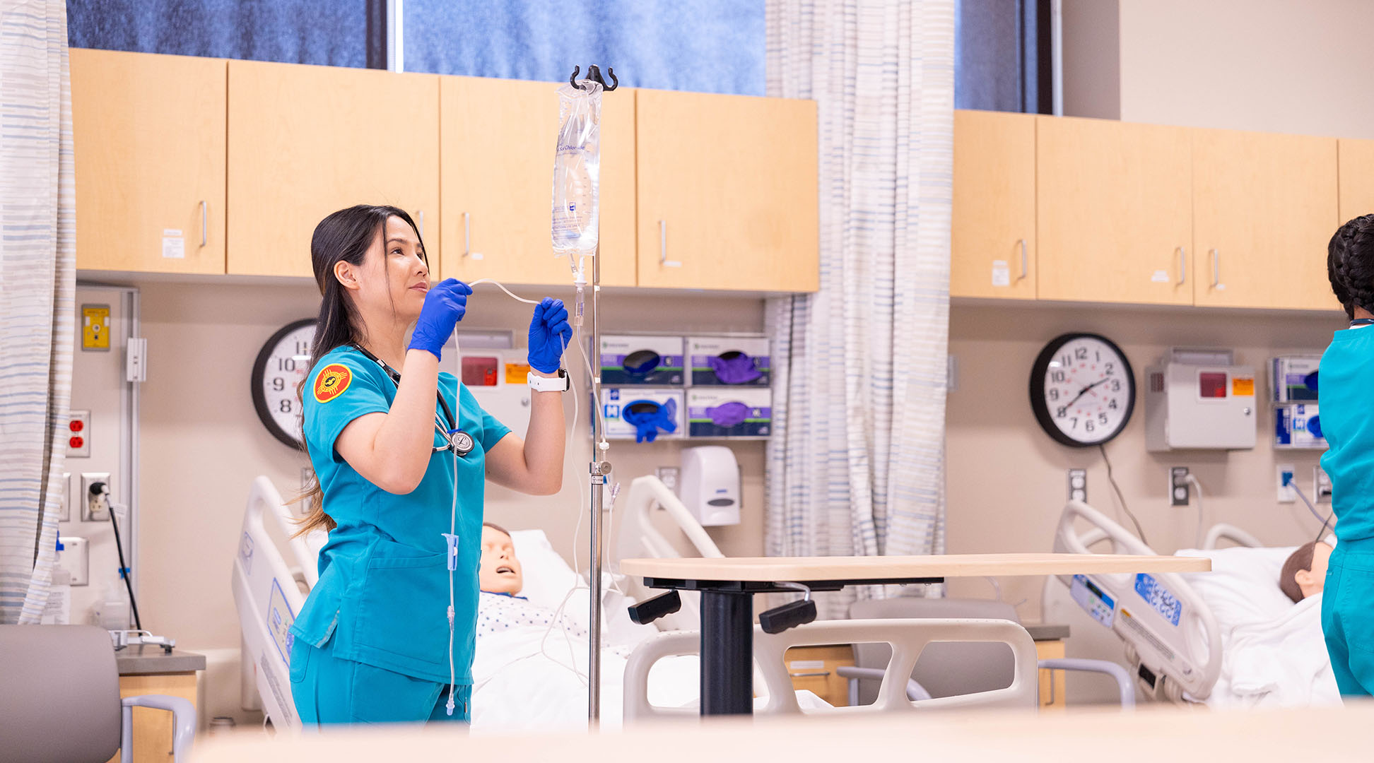 Student practices with IV equipment