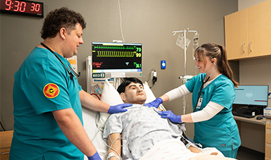 2 students in hospital with manikin
