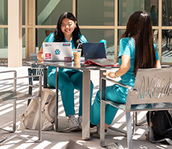 Nursing student walking proudly.