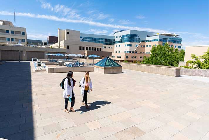 Nursing students walking on campus.