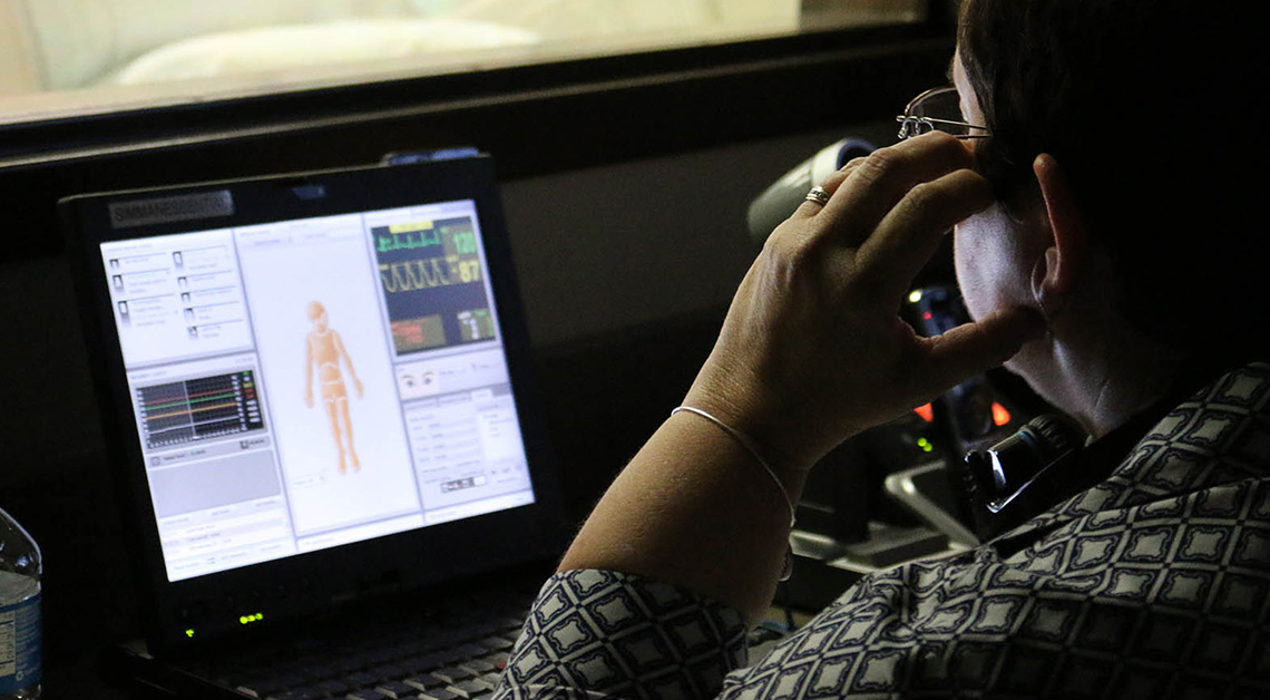 operating manikin in control room