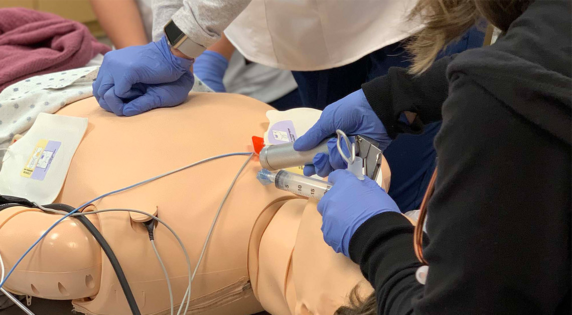 students with manikin